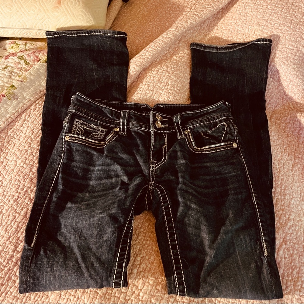Woman’s Vigoss jeans.